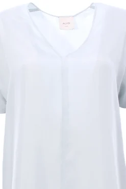 Blusa in seta collo a v